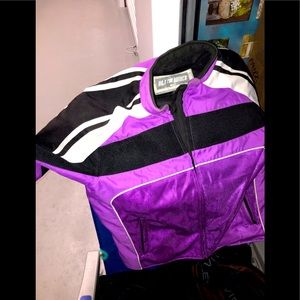 Built woman’s size XL purple and black padded riding jacket. Brand new